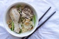 Egg Noodle with Chicken Drum Stick in a bowl and chopsticks. Royalty Free Stock Photo