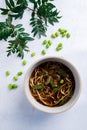 Egg noodle or ramen with soysauce soup topping with green bean in bowl, Asian food. Royalty Free Stock Photo