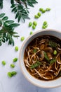 Egg noodle or ramen with soysauce soup topping with green bean in bowl, Asian food. Royalty Free Stock Photo