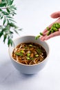 Egg noodle or ramen with soysauce soup topping with green bean in bowl, Asian food. Royalty Free Stock Photo