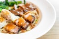 egg noodle with red roasted pork, crispy belly pork and wonton Royalty Free Stock Photo