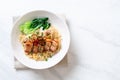 egg noodle soup with crispy pork belly and wonton Royalty Free Stock Photo