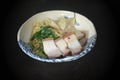 Egg Noodles with Crispy Roast Belly Pork and Wonton Dumplings  and Chinese Kale , Asian Food fusion style Royalty Free Stock Photo