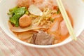 Egg noodles with shrimp and fish ball in red soup Chinese-language called Yong Tau Fu Royalty Free Stock Photo