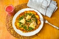 Egg omelette with boiled pea, fried shimeji mushroom and rose-shaped cheese Royalty Free Stock Photo