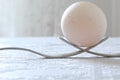 Egg over two forks as a monument close-up, macro Royalty Free Stock Photo