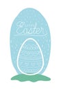 Egg painted easter with hand made font in the field Royalty Free Stock Photo