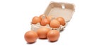 Egg in paper box isolated in white background. Eggs in carton. Green packaging. Chicken eggs from organic farm. Brown cardboard