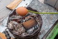 Cooking skewer egg on an old, vintage wood stove, in flames