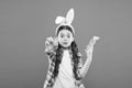 Egg Play on Easter Day. Easter eggs and cute bunny. happy easter. small girl wear bunny ears. kid on easter egg hunt Royalty Free Stock Photo