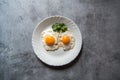 Egg poach sunny side up a healthy food ingredient on a plate.