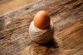 Egg in rope coil on old Royalty Free Stock Photo