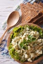 Egg salad with mayonnaise and bread vertical top view Royalty Free Stock Photo