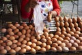 Egg scrambled mix with seasoning on antique old stove for grilled or roasted for sale travelers thai people travel visit at local Royalty Free Stock Photo