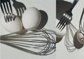 Egg with shadow from the fork. Minimalism. Cooking pastries, omelets. Easy. Whisk for whipping. Collage