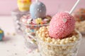 Egg shaped cake pop on table with space for text. Easter celebration Royalty Free Stock Photo