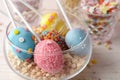 Egg shaped cake pops for Easter celebration on wooden table, closeup Royalty Free Stock Photo