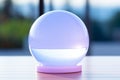 an egg shaped lamp on a table in front of a window Royalty Free Stock Photo