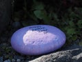 Egg-shaped stone with Happy Easter 2020 inscription Royalty Free Stock Photo