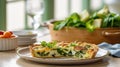 Egg and spinach quiche with cherry tomatoes on a plate in the kitchen. A healthy breakfast menu. Royalty Free Stock Photo