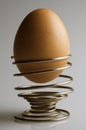 Egg spiral metal egg cup Royalty Free Stock Photo