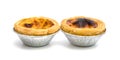 Egg tart in aluminum foil cup isolated on white background Royalty Free Stock Photo