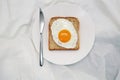 Egg Toast On The White Plate With Silver Knife