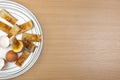 Egg and toasted soldiers on a white pattened plate