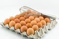 Egg tray and hand whisk