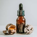 Egg whey in small glass bottles on a white background. Essential oil of quail eggs. Egg facial serum in a cosmetic bottle with Royalty Free Stock Photo