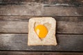 Egg with whole grain bread wooden background