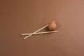 egg and wooden sticks Royalty Free Stock Photo