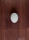Egg on a wooden surface Royalty Free Stock Photo