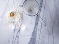 Broken eggs on marble background Royalty Free Stock Photo