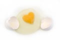 Egg yolk heart-shape Royalty Free Stock Photo