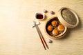 Egg yolk on a pork. Chinese Traditional cuisine concept. Dumplings Dim Sum in bamboo steamer with text copy space. Asian food Royalty Free Stock Photo