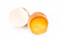 egg yolk in egg shell, cracked egg white isolated on white background Royalty Free Stock Photo