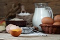 Egg yolk on a wooden table closeup