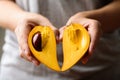 Eggfruit or canistel holding by hand