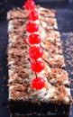 Eggless Creamy Blackforest cake slices in a tray