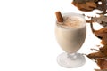 Eggnog Christmas cocktail in a transparent wine glass. Copy space. Royalty Free Stock Photo