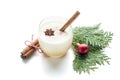 eggnog cocktail in glass arranged with christmas decoration isolated on white background