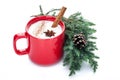 Eggnog cocktail in red mug arranged with christmas decoration is