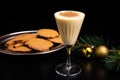 eggnog in a vermouth glass with a mini cocktail umbrella