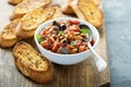 Eggplant caponata with garlic bread Royalty Free Stock Photo