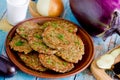 Eggplant couscous patty cakes, pan fried snack pancakes from minced eggplant and couscous