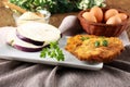 Eggplant cutlet with beaten egg and breadcrumbs