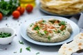 Eggplant dip baba ganoush mutabbal with herbs and paprika on gray wooden background. Selective focus. Traditional arabian food Royalty Free Stock Photo