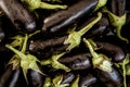 Eggplant fruits heap on market stall