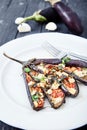 Eggplant with olive oil, basil and cherry tomatoes Royalty Free Stock Photo